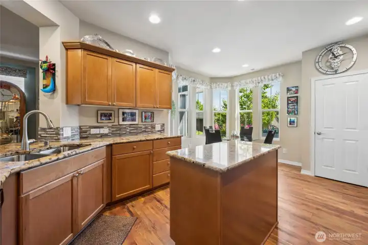 Easy prep island includes pull out drawers for easy storage