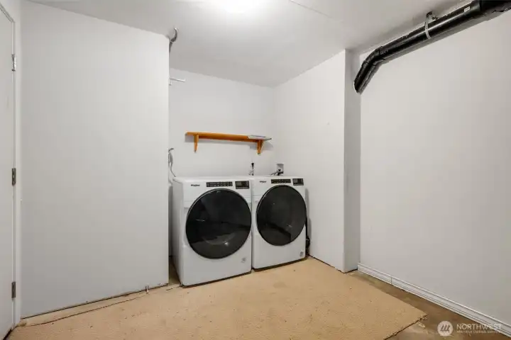 Lower level washer and dryer. Lower level washer and dryer.