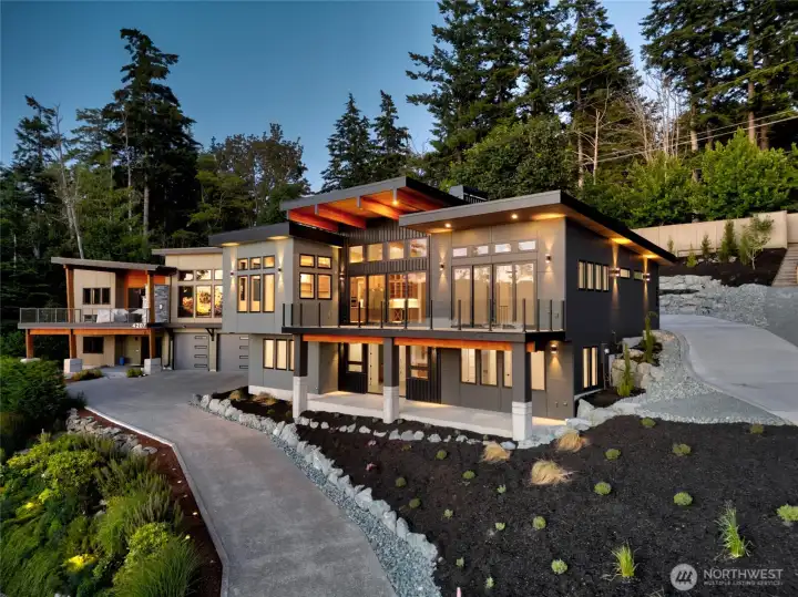 Tall windows allow you to experience island views, stunning sunsets, and luxury living.