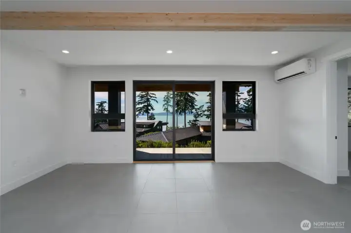 Thoughtfully designed bonus room with panoramic coastal scenery.