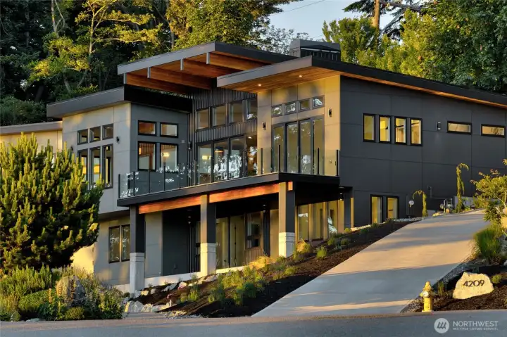 Spacious deck with Lucious landscaping.