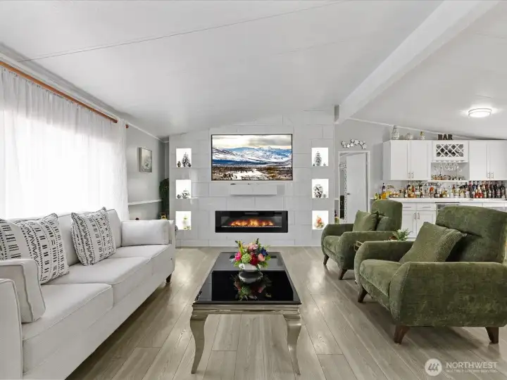 Livingroom with custom built in TV wall.
