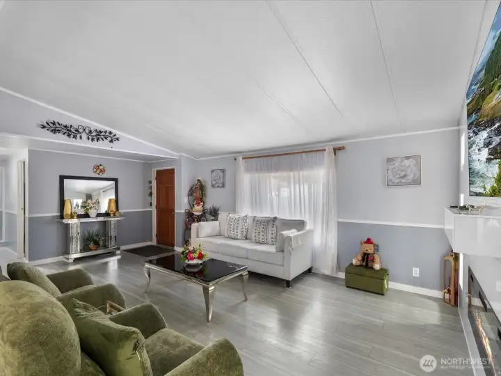 Consistent flooring throughout the home, makes this look and feel luxurious.