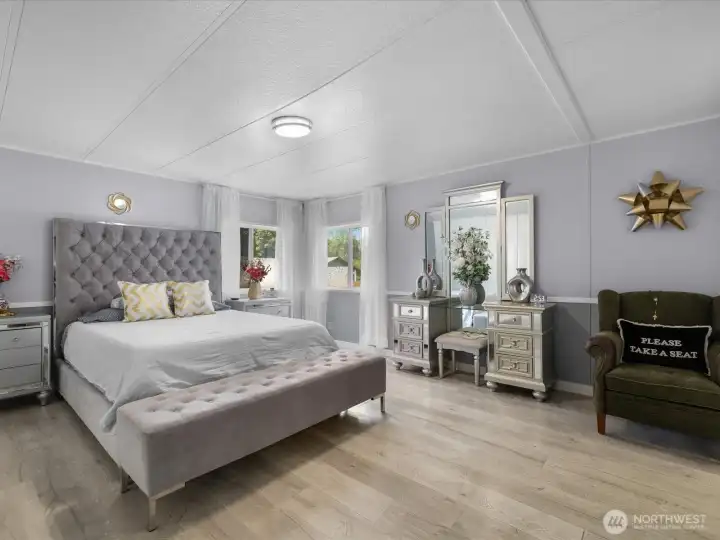 Relaxing spacious primary bedroom.