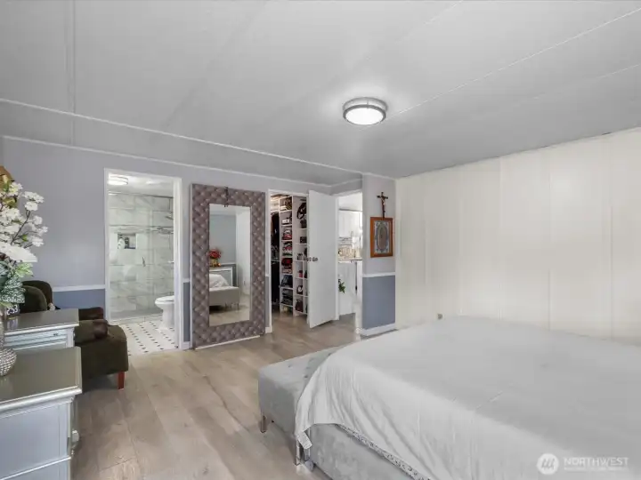 Primary bathroom and walk-in custom closet