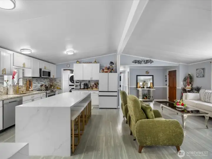 Primary placed on one end of the home, the other bedrooms are down the hallway.