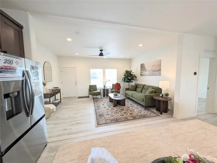 Model Home: Another angle showing the upgraded ceilings & entry/family room/kitchen.