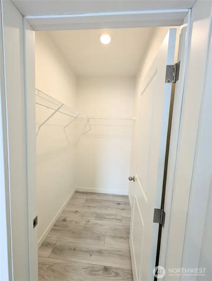 Model Home: Bedroom 2 walk-in closet.