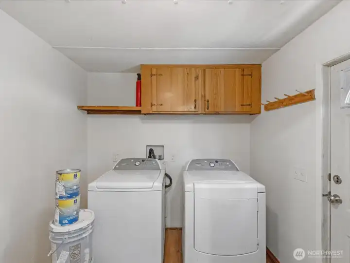 Laundry room off kitchen. Laundry room off kitchen.