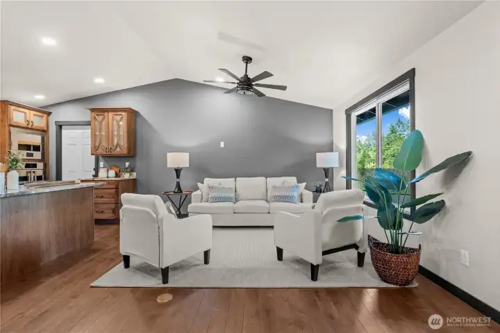 This inviting living room welcomes you to sit down and stay awhile. Flooded with natural light and wrapped in a warm, neutral palette, it’s the perfect sanctuary for relaxing. This inviting living room welcomes you to sit down and stay awhile. Flooded with natural light and wrapped in a warm, neutral palette, it’s the perfect sanctuary for relaxing.