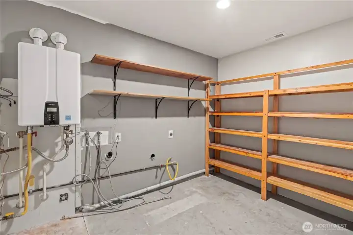 This spacious garage layout cleverly incorporates a bright, dedicated laundry station. It’s the perfect setup for keeping the main living areas clutter-free while offering a highly functional, organized hub for home care. This spacious garage layout cleverly incorporates a bright, dedicated laundry station. It’s the perfect setup for keeping the main living areas clutter-free while offering a highly functional, organized hub for home care.