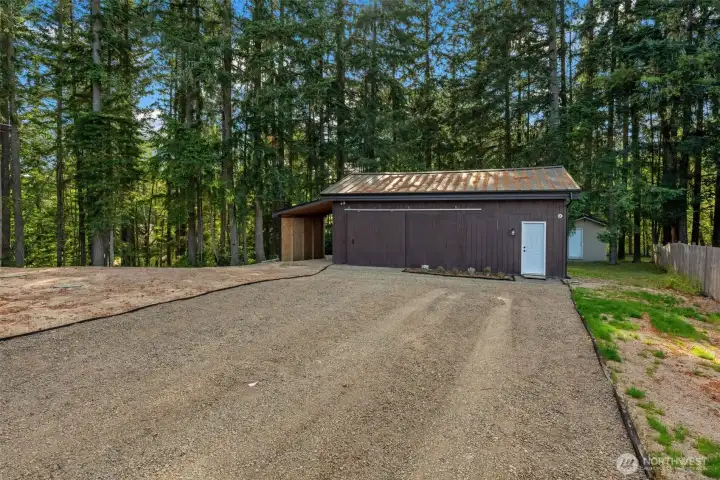 This impressive detached garage offers far more than just pristine vehicle storage. With its spacious layout and clean finishes, it represents the perfect canvas for a dedicated workshop, a home gym, or the ultimate hobbyist retreat. This impressive detached garage offers far more than just pristine vehicle storage. With its spacious layout and clean finishes, it represents the perfect canvas for a dedicated workshop, a home gym, or the ultimate hobbyist retreat.