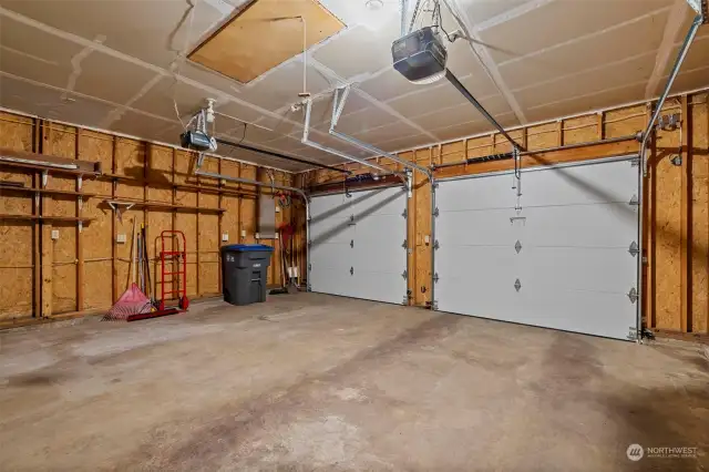 The two car garage enjoys room for lots of additional space.