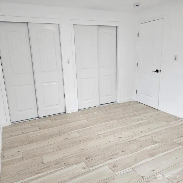 main floor bedroom with double closets