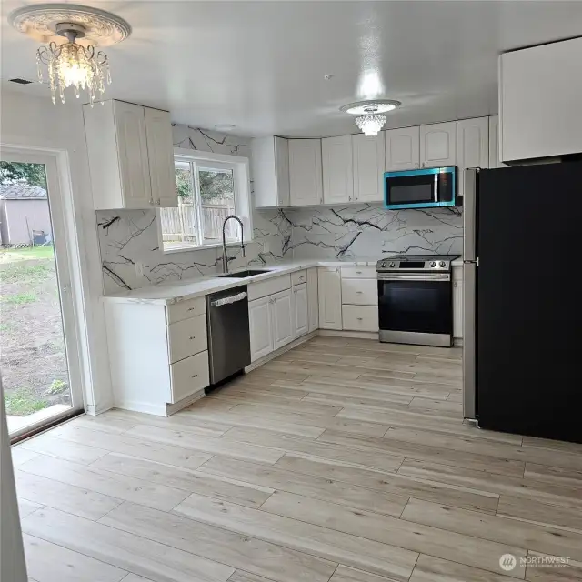 New quartz counters, appliances and room for dining