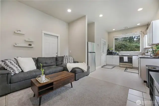 Building #2  Size: 3960 sqft + 594 sqft DADU = 4554 total square feet. (DADU means Detached Accessory Dwelling Unit, additional living quarters)  Commercial gas furnace - heats complete shop,   Fully finished & insulated building,  Washer / dryer / sink,  Large utility shower wash station,  Full drainage system throughout.  12x12 fully insulated power smart shop bay door,  12x12 roll-up shop bay door,   Cat5 Wired with WIFI,   Smart thermostats,  All new LED lighting