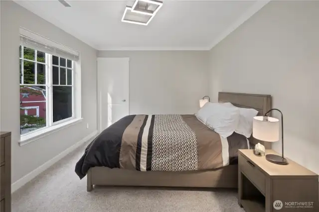 First upstairs bedroom with fantastic views of the backyard blooms