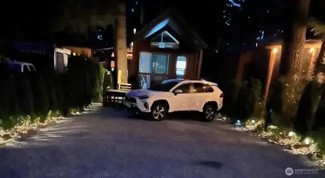 Night with lights in driveway