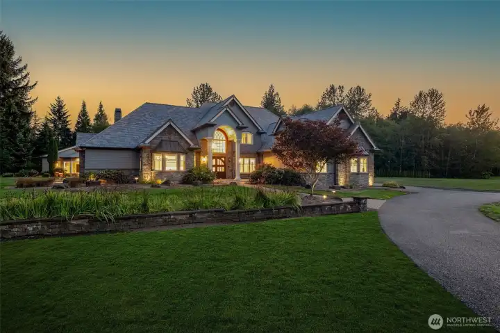 The main home. East facing with a Davinci Roof set to last FOREVER! The lawn has been enhanced digitally to showcase and add to the beauty.