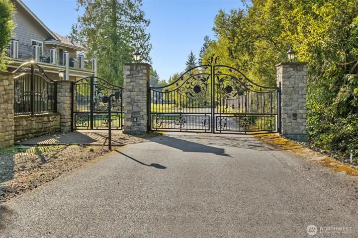 Grand gated entrance at the back side of this property adds to the elegance and privacy of this estate.