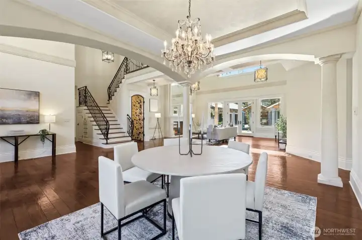 Formal dining area overlooking the living room and the front of the home.