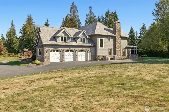 3 car oversized garage attached to the main house.