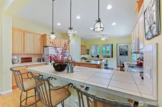 The Monticello has the best kitchen for entertaining with a large peninsula for seating and a center island for prep.