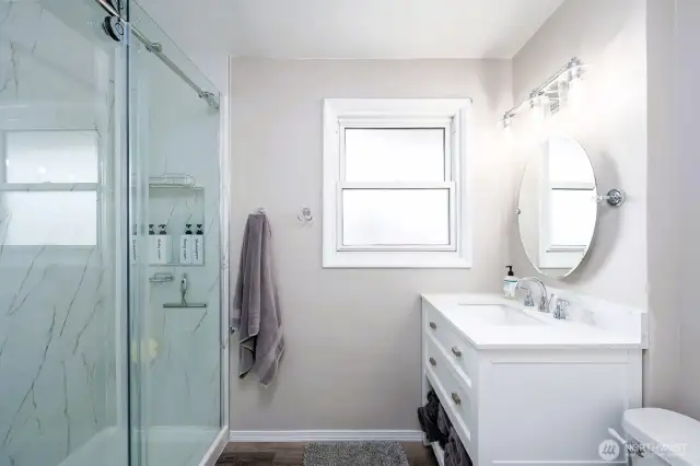 Primary bedroom's bath. Gorgeous marble.