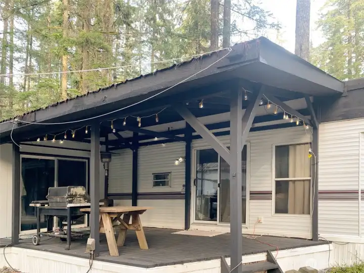 New Edison bulb lights hung around the porch.