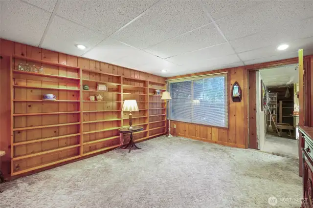 Rec room with door to basment workshop.