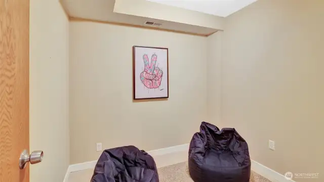 Cozy flex space ideal for a home office, reading nook, or creative corner.