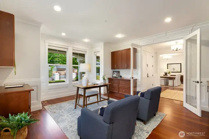Off to your right when you enter is this spacious office. Note the french doors and storage galore!