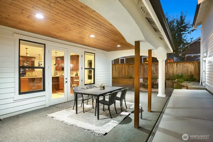 Just off the kitchen french doors is this covered patio with gas line hook up for your grill.
