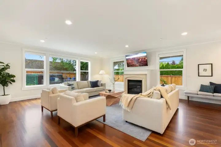 Back inside and also visible from the kitchen, this space is the size of to large rooms - and so easy to entertain in!