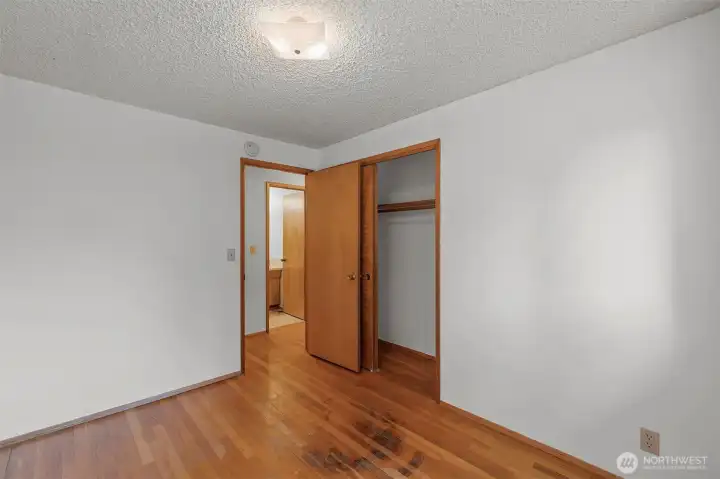 Main level bedroom with original hardwood floors