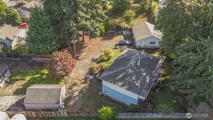 Drone view of house and detached garage