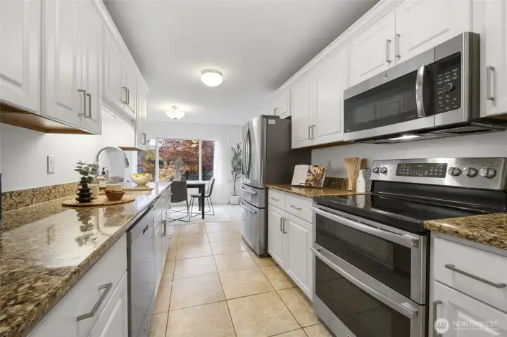 Abundant cabinetry and thoughtful design make this kitchen a cook’s delight.