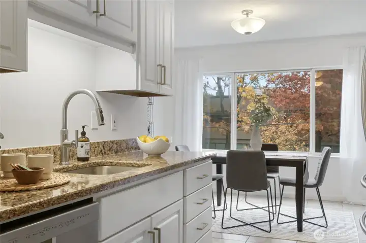A soothing palette of cool tones unites the spaces, giving the home a fresh and harmonious feel.