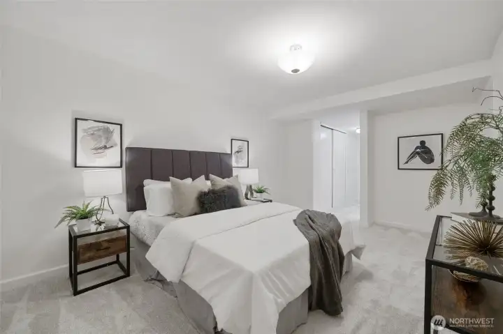 Enjoy the spacious primary bedroom with plenty of room for your favorite art and extra-large closets to keep everything organized.