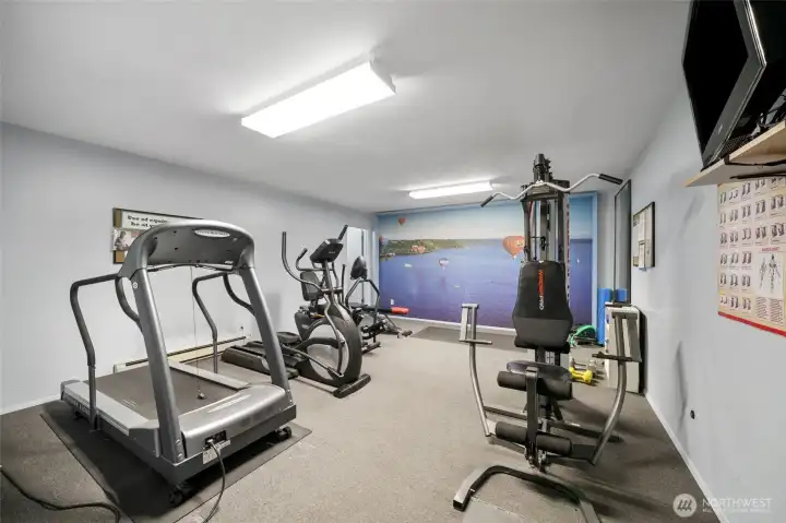 Stay active even on rainy days with the building’s workout room.