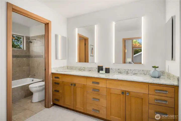 Second upstairs bath area with tub/shower.