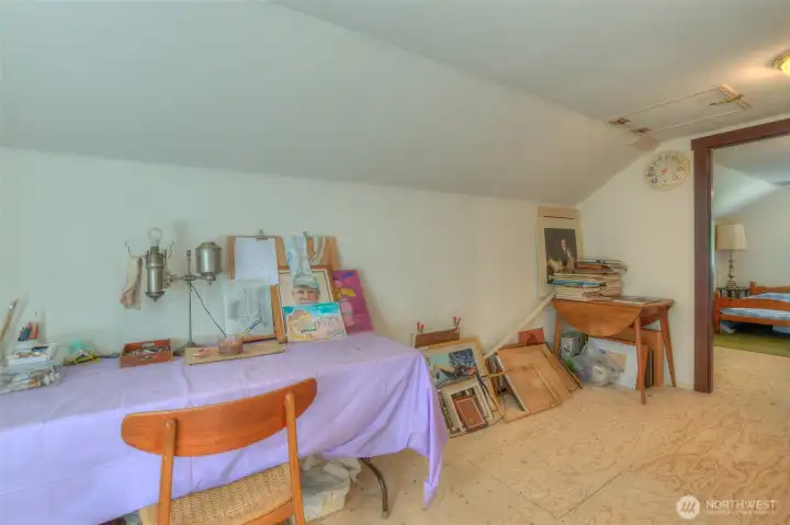 Off the 3rd floor guest space is currently used as artist studio.