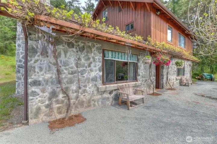 Exceptional hand done rock work exemplifies the old world, lasting construction, of this home.