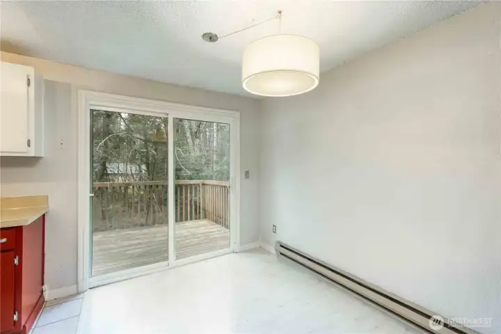 Dining area looking to slider to large deck
