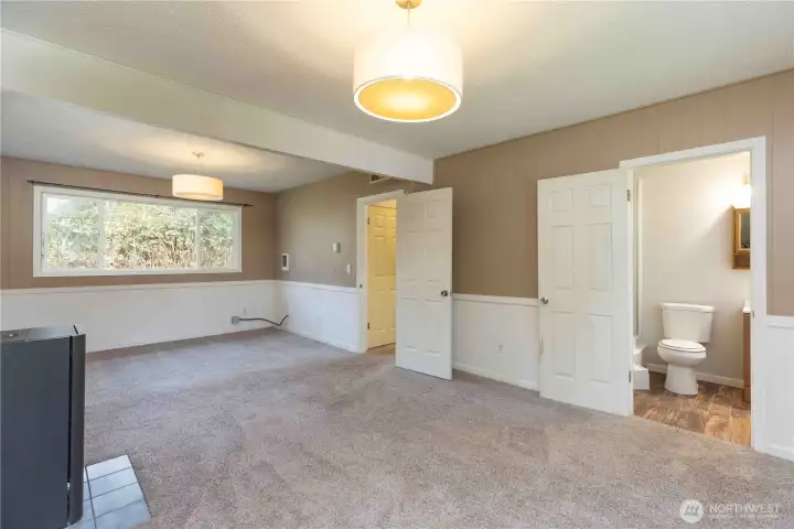 Large Family Room downstairs with 3/4 bathroom
