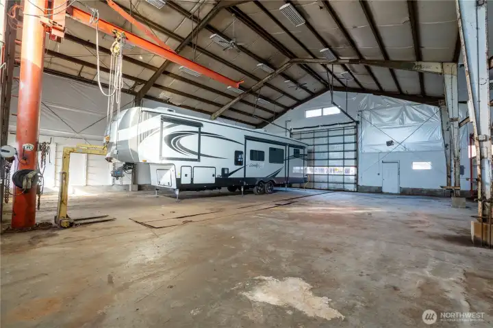 Commercial grade shop is 3,575 square feet and has a commercial grade hoist.