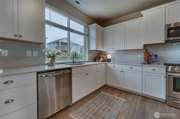 Check out the outdoor space while doing the dishes.