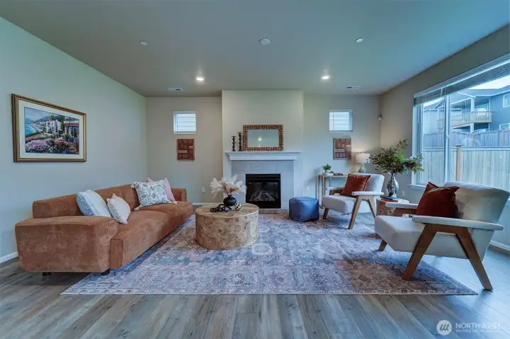 Large living space with gas fireplace, large windows that again, brings in natural light. The LED's are just a bonus.