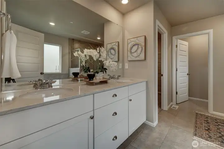 Double vanity and quartz countertops - no fighting over this sink.