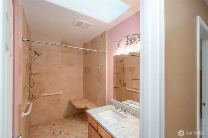 Custom stone walk-in shower